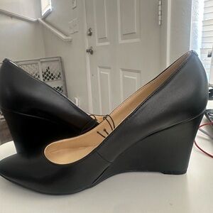 Elegant Nine West Black Wedge Heels
